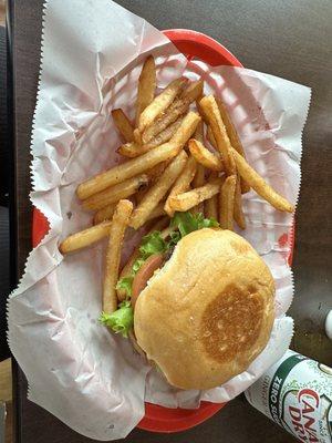 Cheese burger with fries and drink.