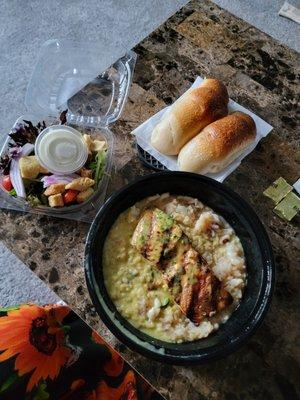 Grilled salmon with peach pesto over seafood risotto. Meal came with side salad and their delicious house made rolls.