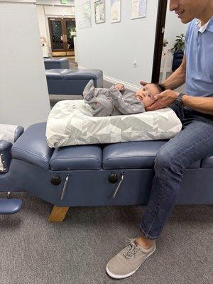 My 11 week old son getting his adjustment!