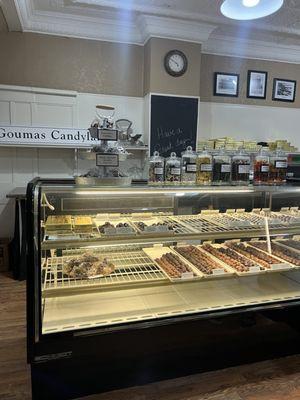 Display case with candy by the pound.  You can buy pieces by weight as well.