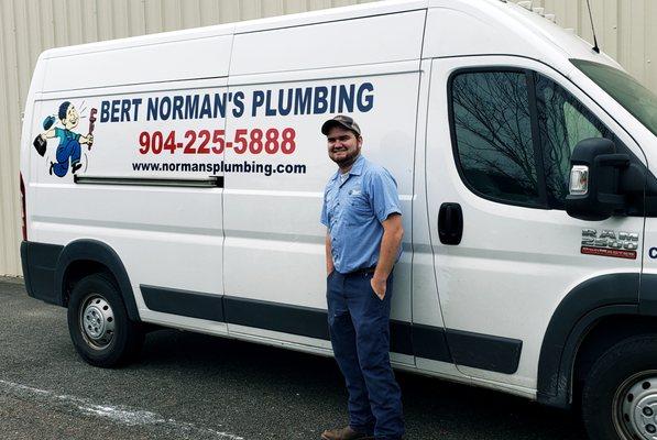 Bert Norman's Plumbing technician standing by his truck in Yulee, FL.