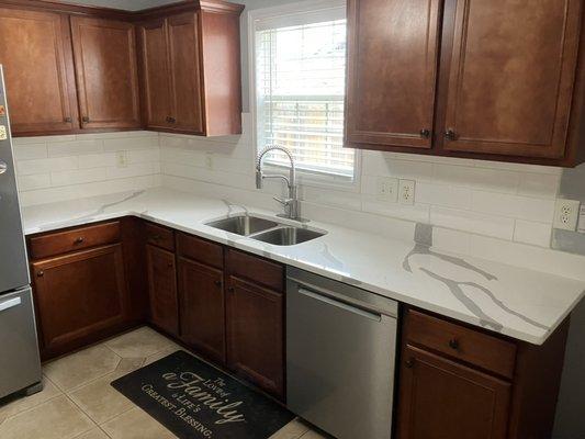 Backsplash installation. Faucet repair.