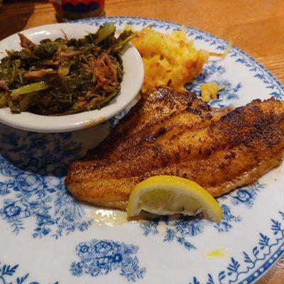 Catfish with hash brown casserole and turnip greens.