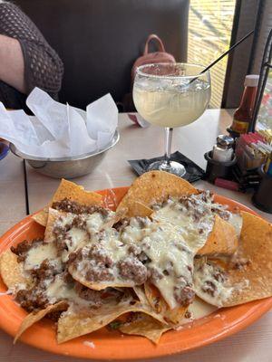 Beef nachos with house margarita