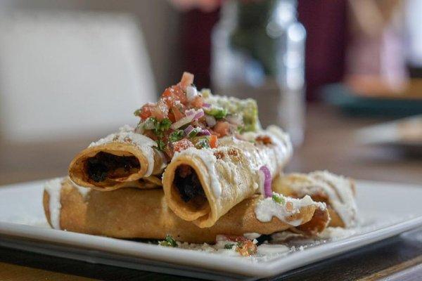 Beef taquitos with our special green salsa, sour cream, pico de gallo