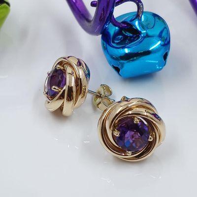 Amethyst earrings in 14k yellow gold.