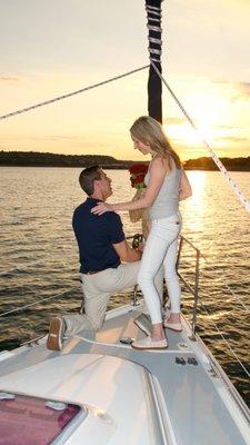 Romantic wedding engagement on a beautiful sailing yacht.