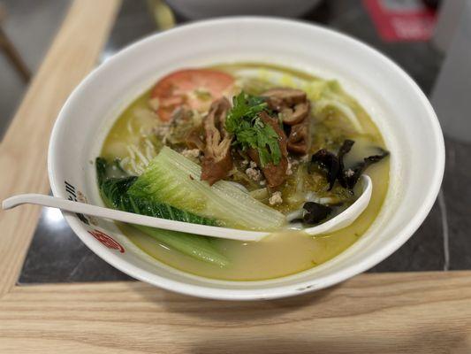 Rice noodles in pickled mustard soup with hog fat end