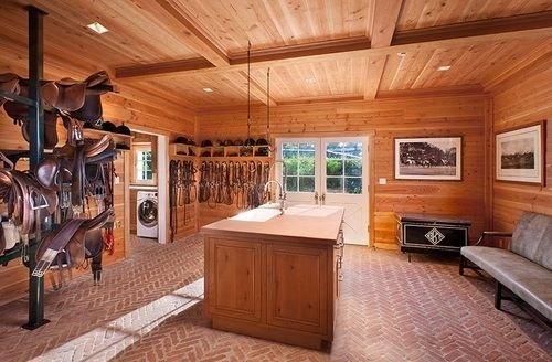 Love my new tack room!
 The sink is very convenient and the French doors they added let in tons of light.