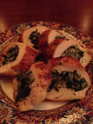 Chicken Breast stuffed with caramelized onions, spinach, and manchego cheese.