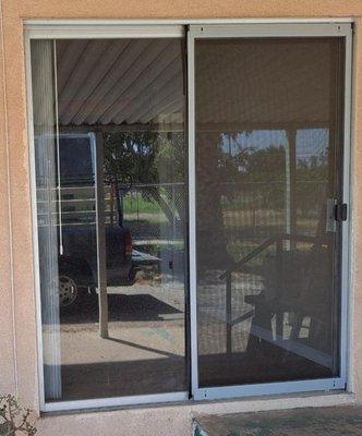 Outside view before patio door retro fit install