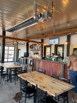 Bar area where you order - large & spacious TVs behind it