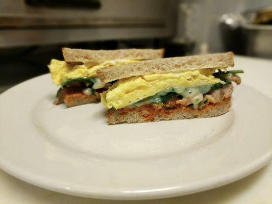 Laurel Sandwich with chicken garlic sausage and romesco sauce