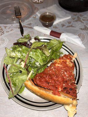 Deep dish pizza and green salad.