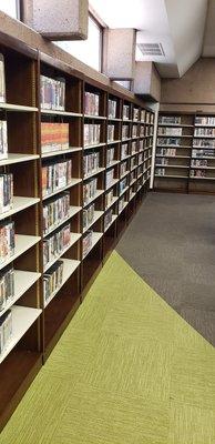 Rows of books, DVDs, and audio