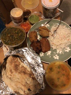 So much food!!  Pre-fixe menu of lamb vindaloo, veggie soup, samosa, balsamic rice, naan, tice pudding, and so many side sauces!