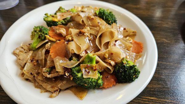 Pad See Ew, wide noodles, pork and broccoli.