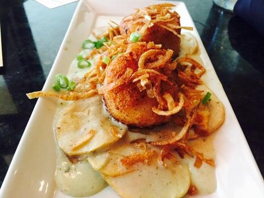 Scallops over scalloped potatoes! Yum!