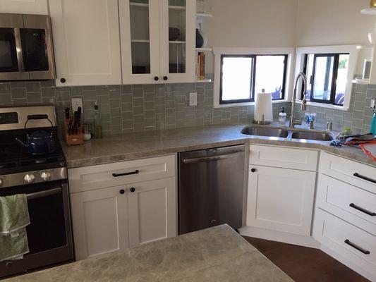 QUARTZ COUNTERTOP AND TILE BACKSPLASH