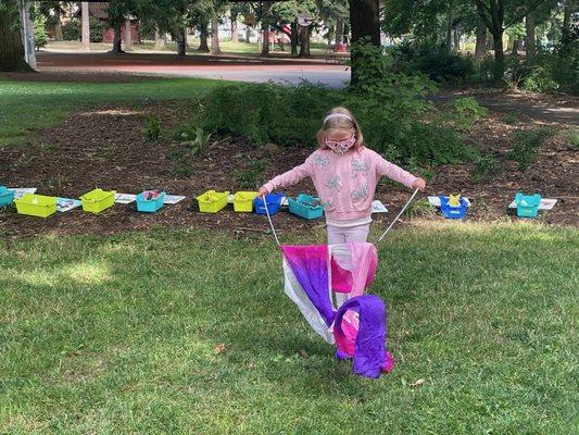 Anika uses ribbon wands to be different kinds of weather!