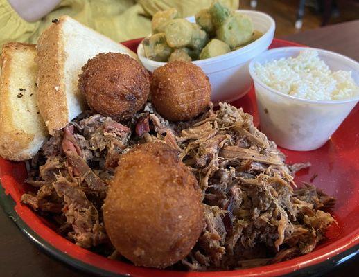 Chopped brisket, Hushpuppies, slaw, fried okra and Texas toast