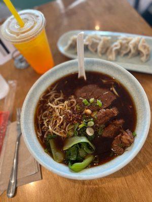 Braised beef noodle soup  Pork with Napa Cabbage Dumplings Mango tea