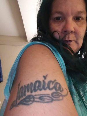 Tattoo of  name jamaica By Tattoo Artist Eric