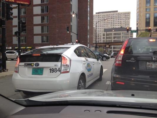 This driver got impatient waiting at a red light so he thought he would just use the oncoming lane and nearly cause an accident.