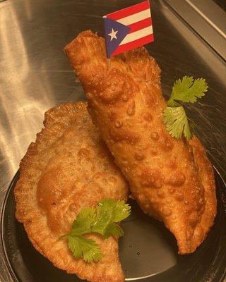 Pastelillo: Turnover filled with choice of seasoned Beef or Chicken or Monterey-Jack & Cheddar Cheese