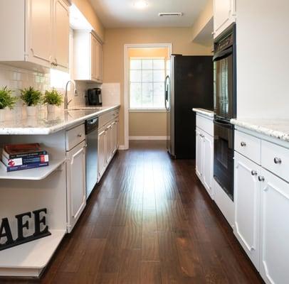 Engineered hardwood floor installed in kitchen