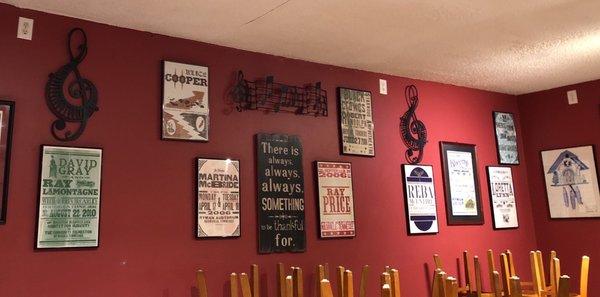 Concert posters for famous musicians and groups who've been catered by this amazing restaurant!!