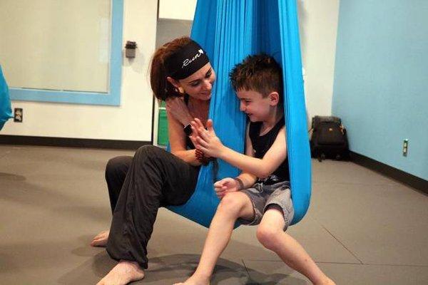 Aerial Partner Pose at Mindful Child Aerial Yoga