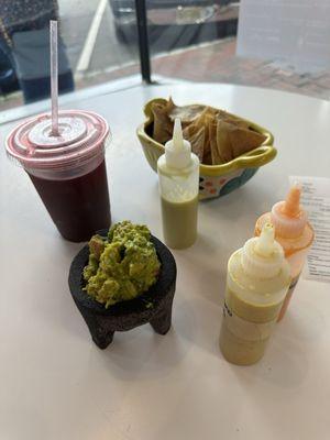 Guacamole with home made salsas and hibiscus tea.