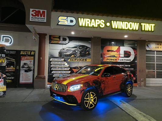 Full Mercedes wraps, window tint , powder coating , neon lights , neon light wraps and custom printed wrap.