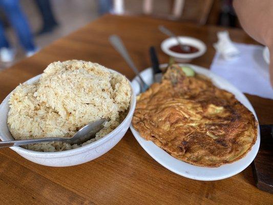 Garlic rice (bowl) and eggplant omelette / tortang talong