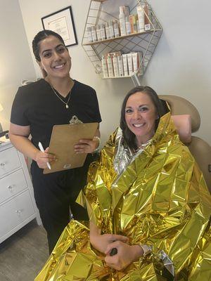 Cat performing a Brella on Christina! Brella decreases underarm sweat production by 50-75%. This treatment lasting about 3mo.