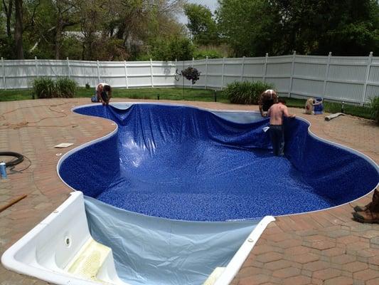 Their crew changing the liner