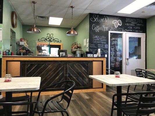 Counter and some of the seating at Selina's Coffee