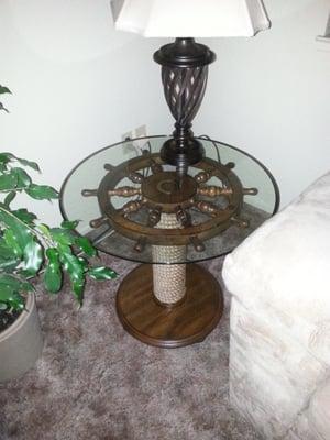 End table w/ nautical theme.