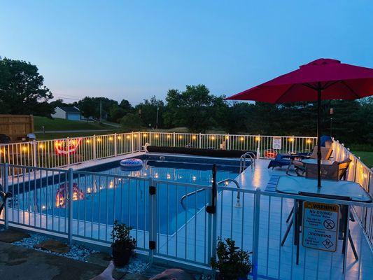 A recessed Kayak Pool with lights and decor