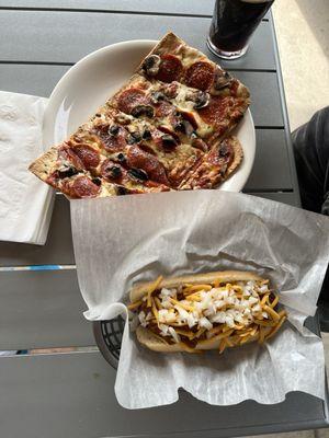 My buddy just ordered the pizza and a chili cheese dog. Looks good!