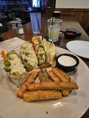 Veggie rolls. Fresh Veggies with Spanish rice and queso with zucchini fries