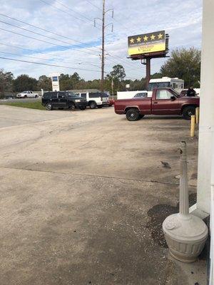 Vehicles all around needing maintenance.