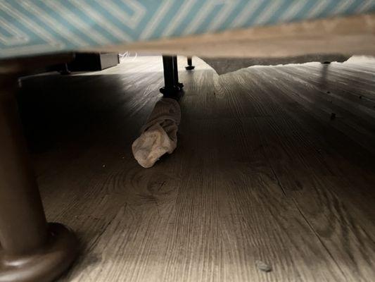 Dirty sock under the bed