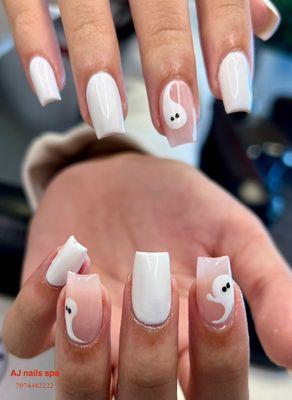 Getting into the spooky spirit with these ghostly nails!  Perfect for Halloween vibes.  #NailGoals"