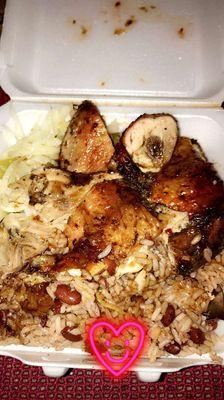 Jerk chicken with rice and peas and cabbage