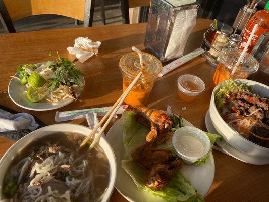 Special combination pho (#6), fried chicken wings, thai iced tea, and bun (#20)