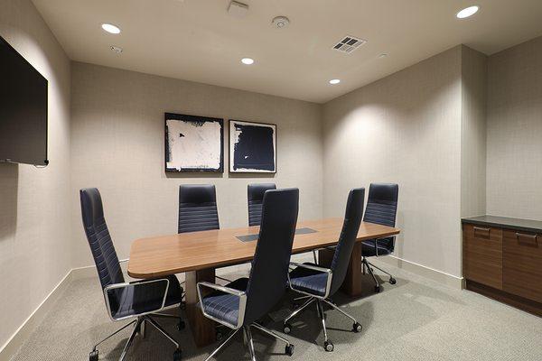 Executive conference room for resident meetings and events a caption