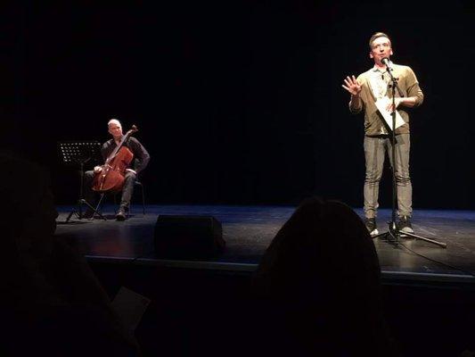 Yours truly as the musician/timekeeper at the Moth Grandslam