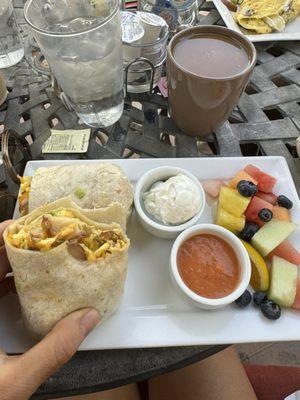 Breakfast burrito, coffee and fruit